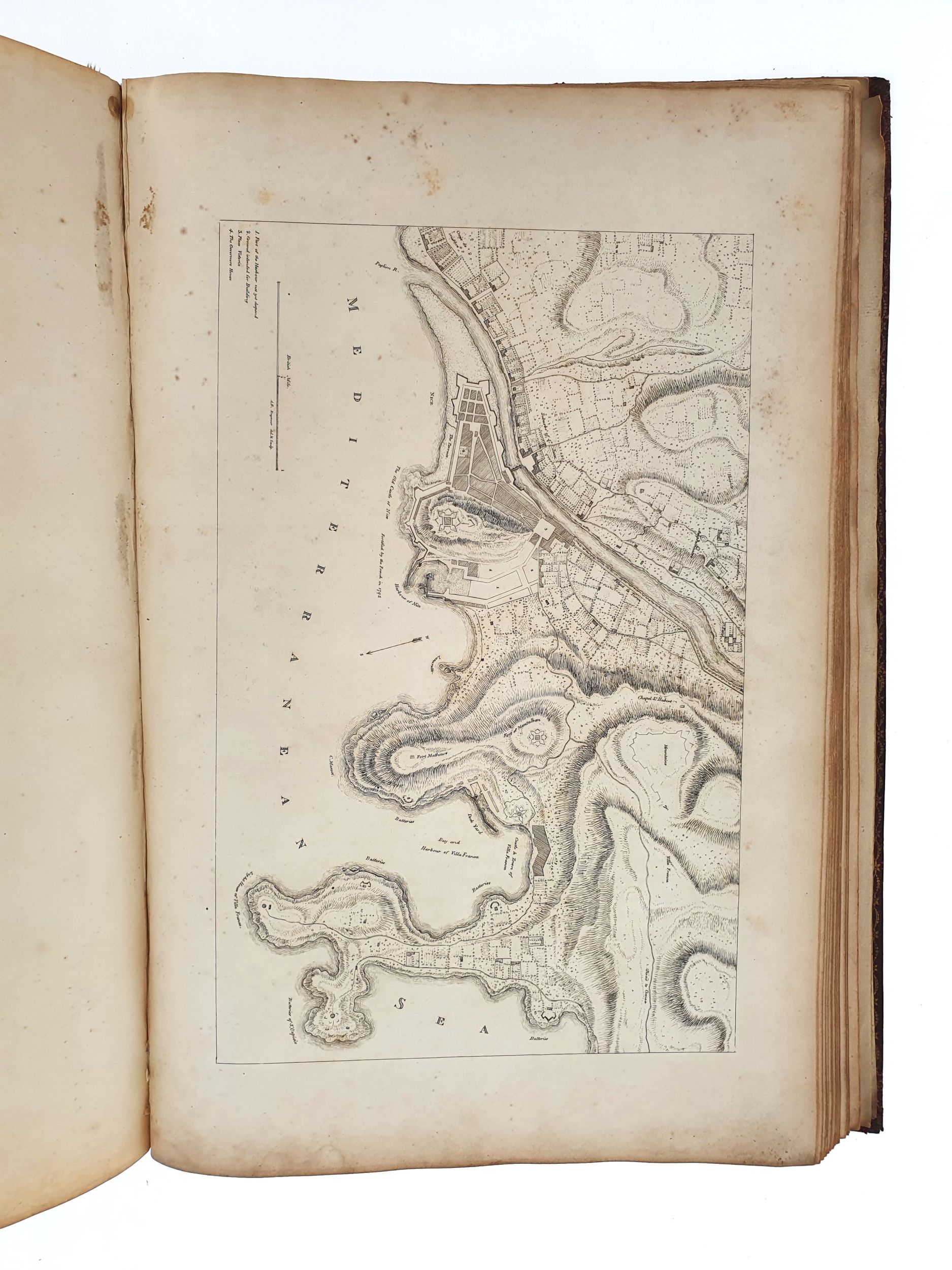 ALBANIS-BEAUMONT (Jean François). Travels through the Maritime Alps, from Italy to Lyons, across the Col de Tende, by the Way of Nice, Provence, Languedoc, c. with Topographical and Historical Descriptions. To which are added, some Philosophical Observations on the various Appearances in Mineralogy, c. found in those Countries. London, Printed by T. Bensley, 1795. In-folio, maroquin rouge à grain long, fine roulette dentelée dorée encadrant les plats, dos lisse à décor mosaïqué (reliure de l’époque).	:  | H&ocirc;tel Des Ventes de Monte-Carlo