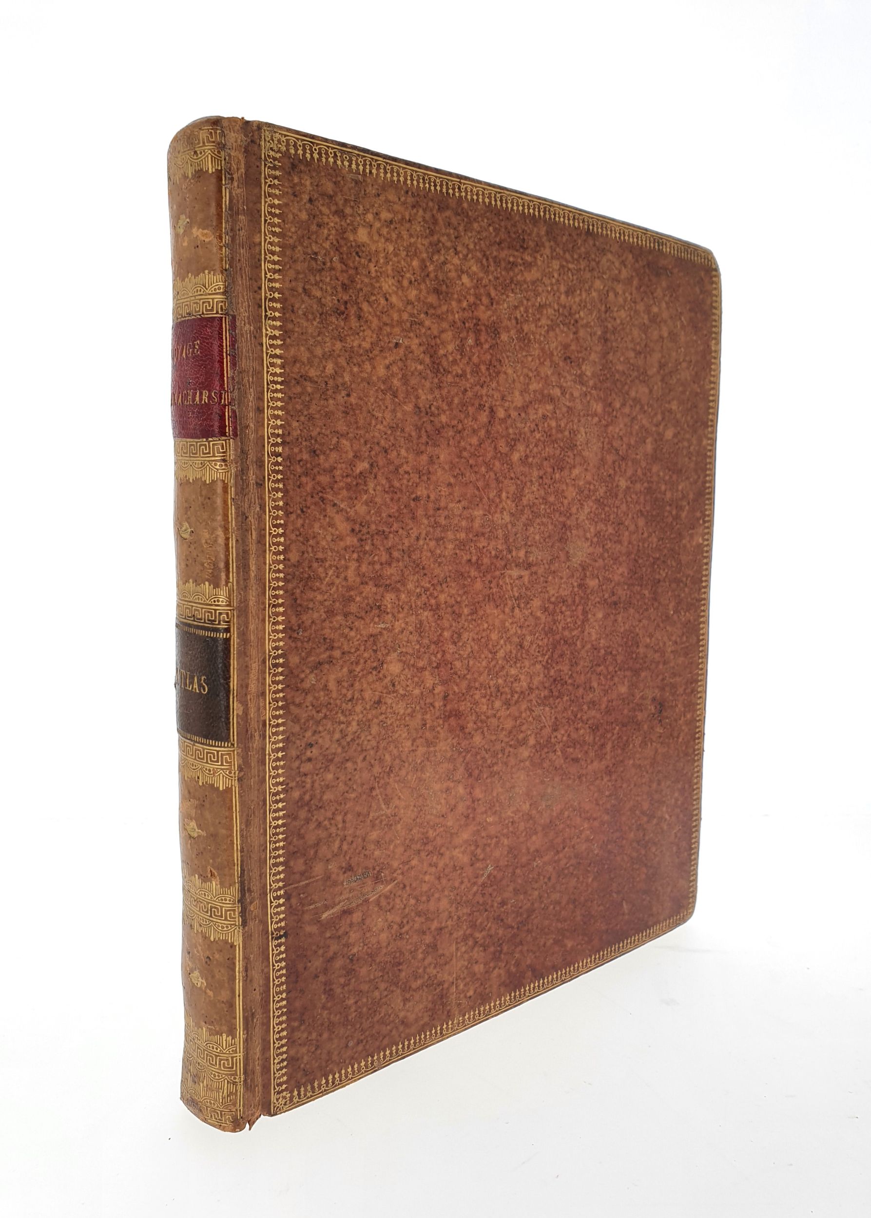 BARTHÉLEMY (Jean Jacques). Recueil de cartes géographiques, plans, vues et médailles de l’ancienne Grece, relatifs au Voyage du jeune Anacharsis […]. A Paris, De l’Imprimerie de Didot Jeune, an VII [1798/1799]. In-4°, veau, fine roulette dentelée dorée encadrant les plats, dos lisse orné, tranches dorées (reliure de l’époque).	