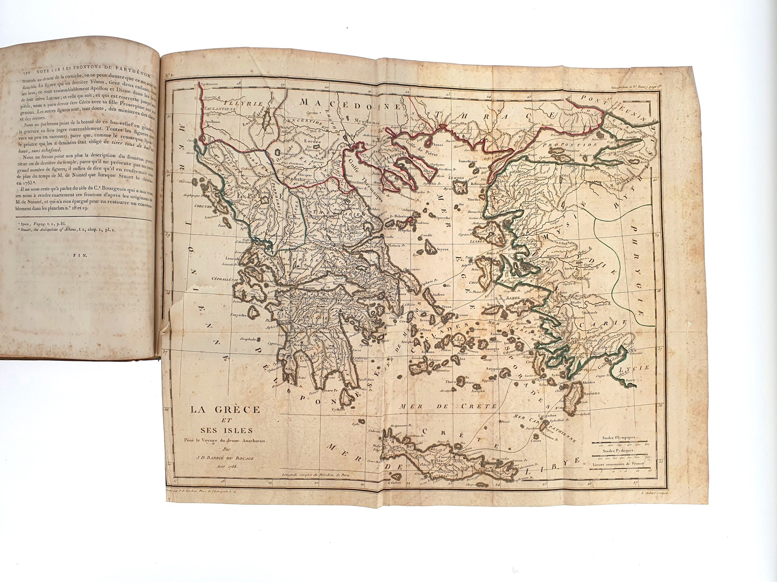 BARTHÉLEMY (Jean Jacques). Recueil de cartes géographiques, plans, vues et médailles de l’ancienne Grece, relatifs au Voyage du jeune Anacharsis […]. A Paris, De l’Imprimerie de Didot Jeune, an VII [1798/1799]. In-4°, veau, fine roulette dentelée dorée encadrant les plats, dos lisse orné, tranches dorées (reliure de l’époque).	:  | H&ocirc;tel Des Ventes de Monte-Carlo