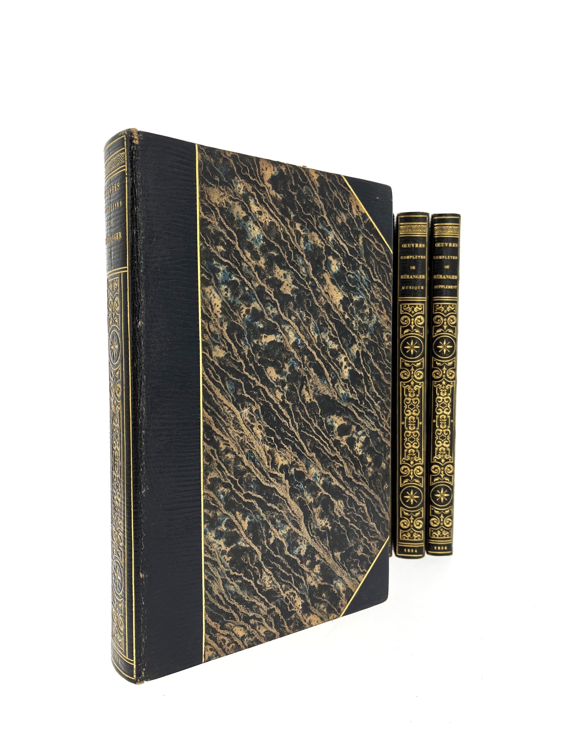 [CURIOSA]. BÉRANGER (Pierre Joseph de). • Œuvres complètes. Paris, Perrotin Éditeur, 1834 (4 vol.), •• Musique des chansons. Paris, Perrotin Éditeur, 1834,  ••• […] Supplément. Paris, Chez tous les marchands de nouveautés, 1836. Ensemble 6 volumes in-8°, demi-maroquin bleu nuit à coins, filet doré bordant les plats, dos lisse orné, non rogné, couvertures conservées [pour le t. VI] (Stroobants).	:  | H&ocirc;tel Des Ventes de Monte-Carlo