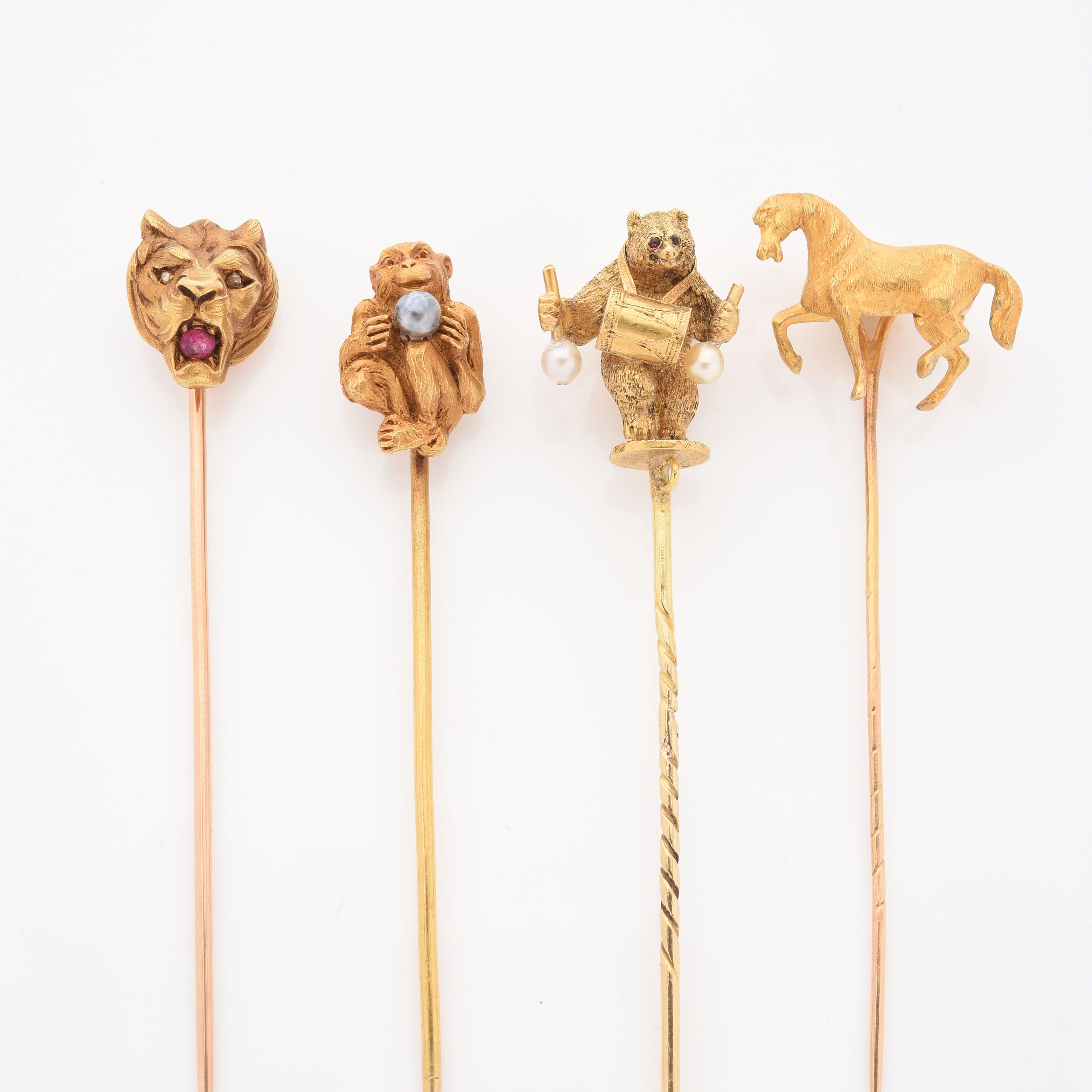 ENSEMBLE DE 4 ÉPINGLES DE CRAVATE :