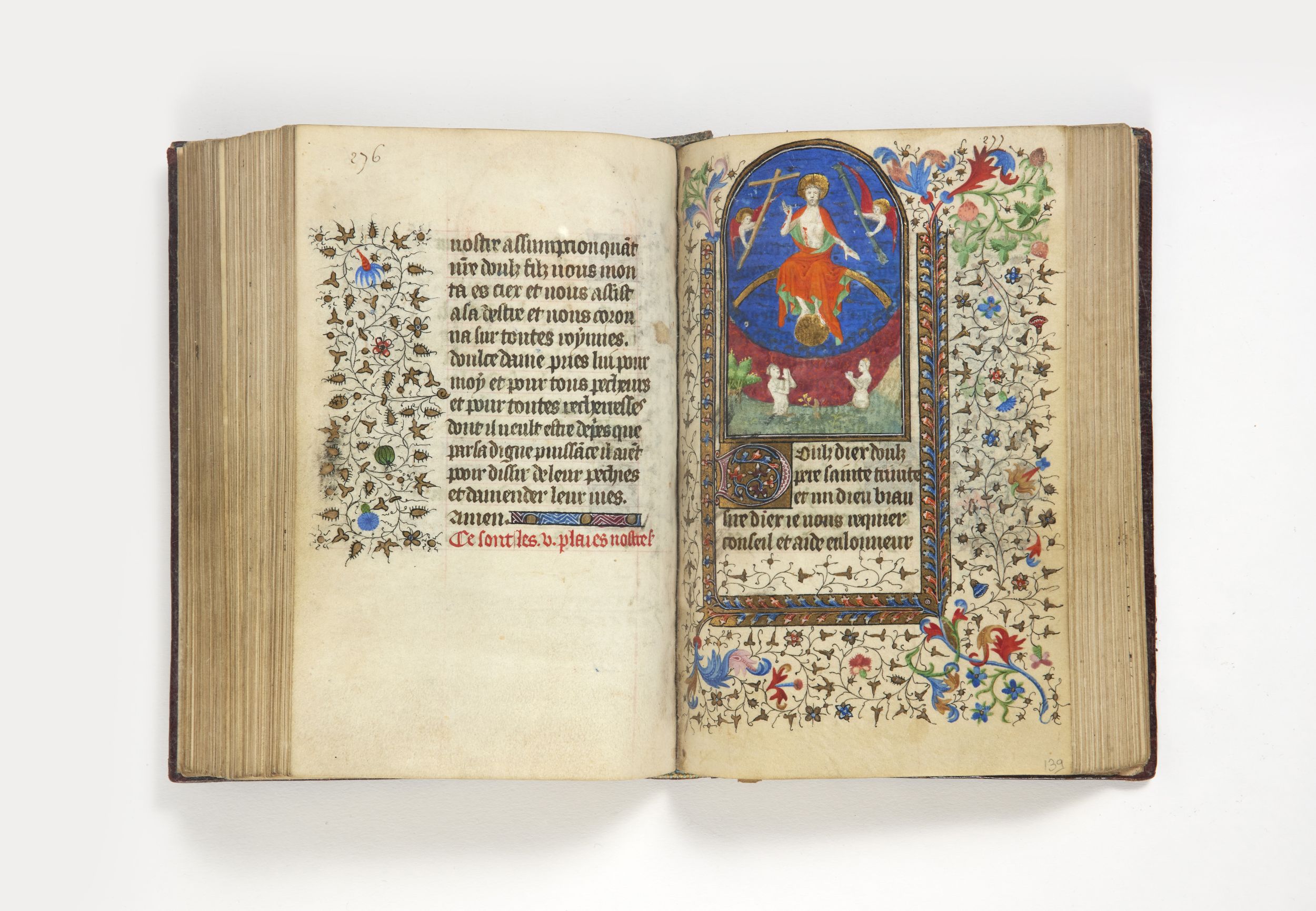 [HEURES MANUSCRITES ENLUMINÉES / PARIS]. Livre d’heures à l’usage du diocèse de Paris. Manuscrit du début du Xvème s. en un volume petit in-8° ancien (117 x 172mm), maroquin rouge, filets et roulettes dentelées dorés encadrant les plats, dos lisse orné,